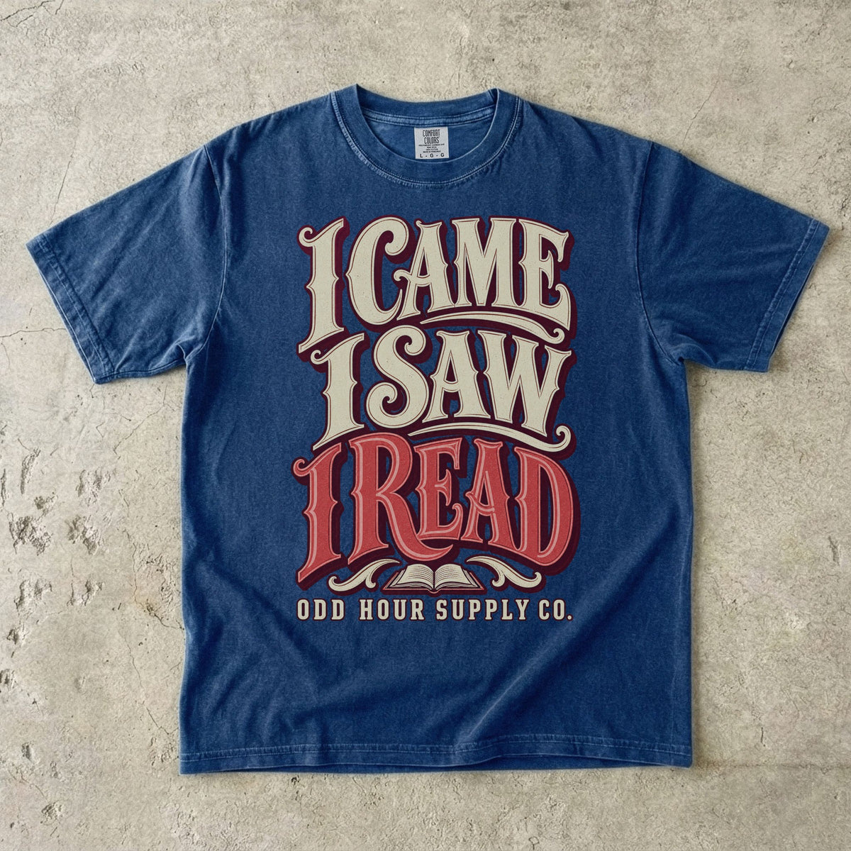 True Navy T-shirt with bold retro I CAME I SAW I READ lettering and Odd Hour Supply Co. branding.