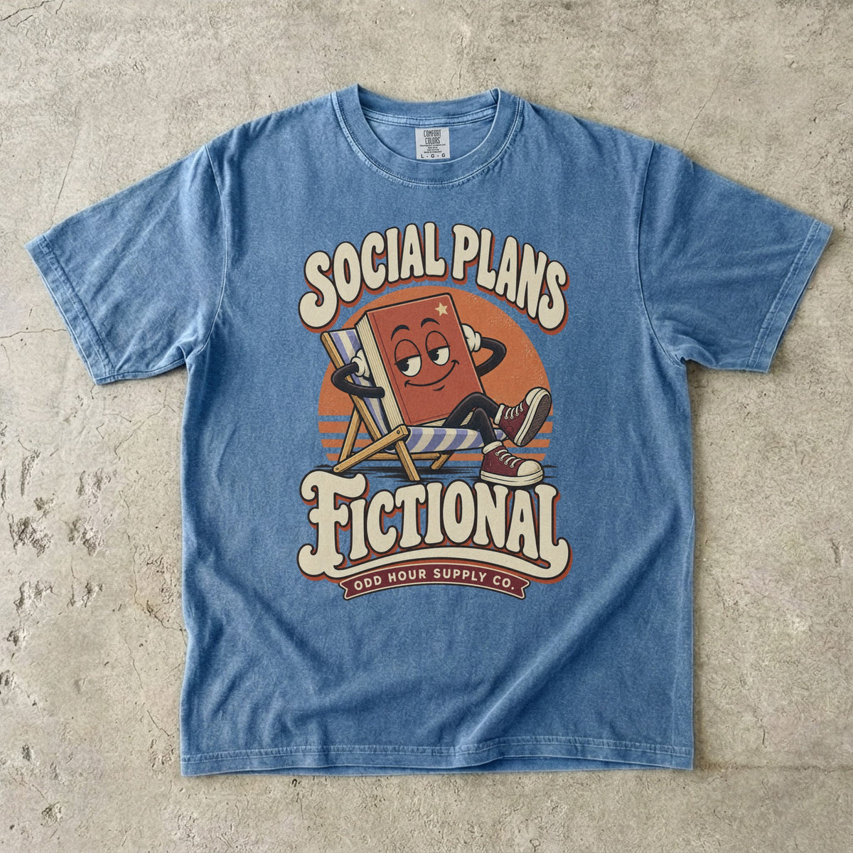 Blue Jean T-shirt featuring a lounging book character and SOCIAL PLANS FICTIONAL by Odd Hour Supply Co.