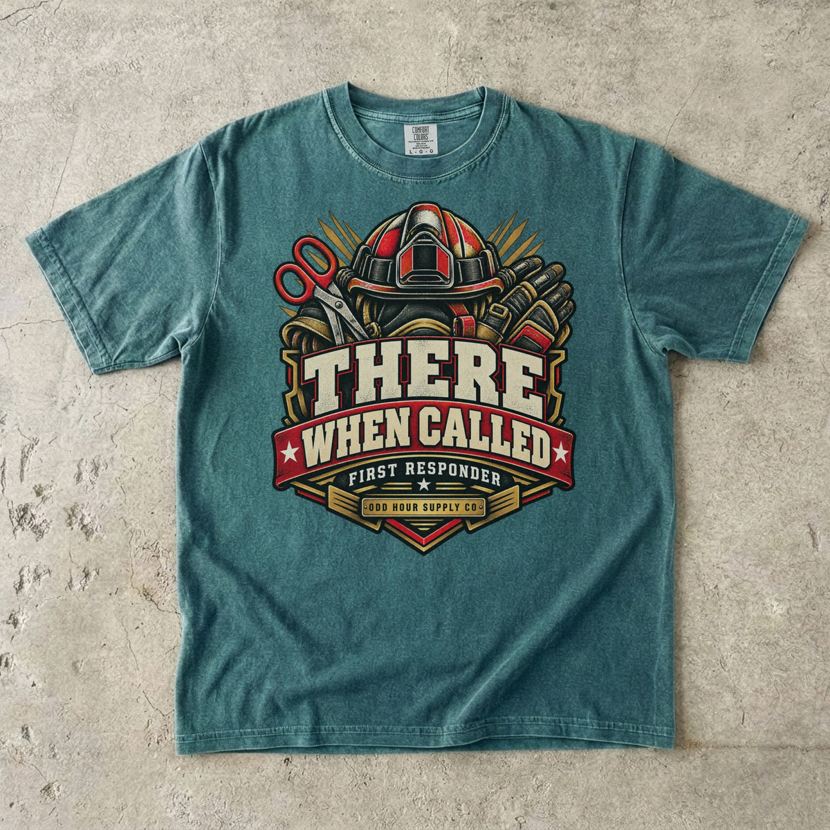 Blue Spruce Comfort Colors 1717 T-shirt with There When Called badge, rescue helmet, shears, gloves and a deep-red banner.
