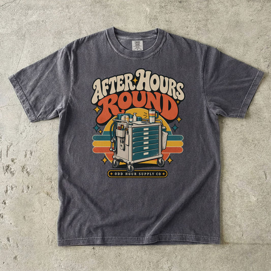 After Hours Round retro healthcare cart graphic on a Pepper Comfort Colors T-shirt
