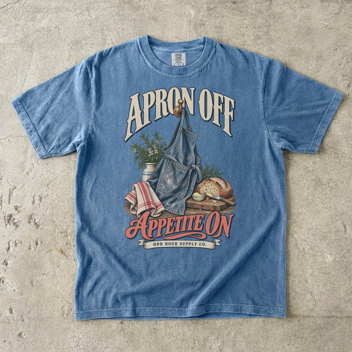Blue Jean T-shirt featuring a denim apron, fresh bread and APRON OFF APPETITE ON by Odd Hour Supply Co.