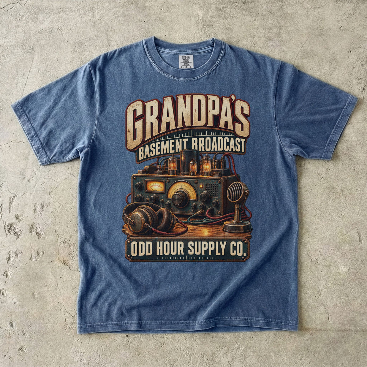 Denim T-shirt with GRANDPA’S BASEMENT BROADCAST, vintage radio equipment, headphones and a microphone by Odd Hour Supply Co.