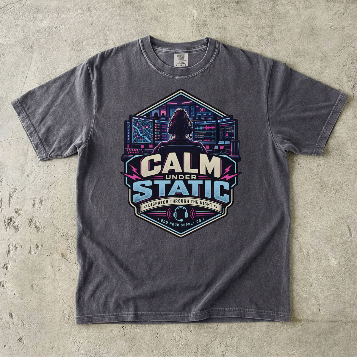 Pepper Comfort Colors 1717 T-shirt with Calm Under Static front graphic, dispatcher, control-room screens and cyan-magenta details.