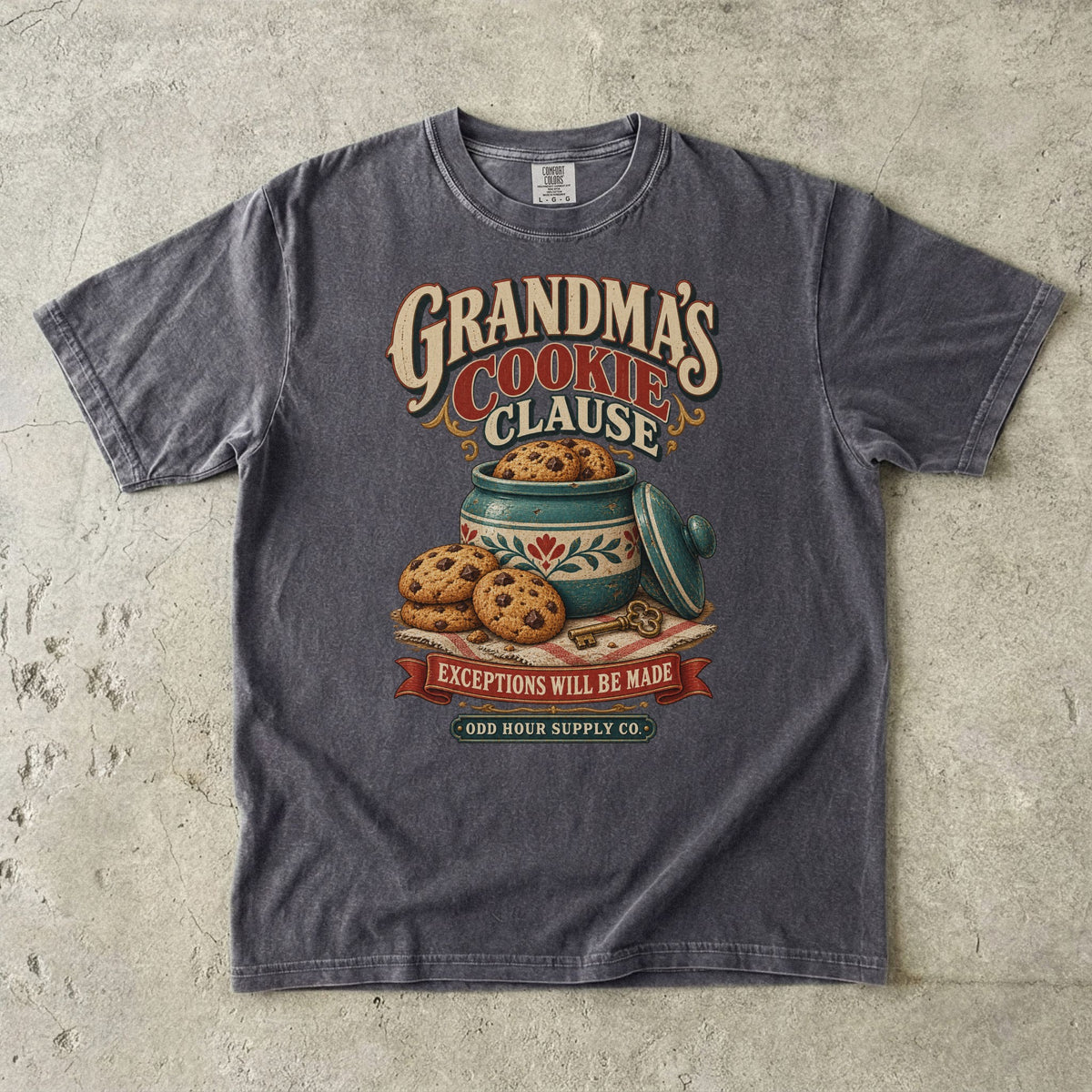 Pepper Comfort Colors 1717 T-shirt with a cookie jar, cookies, a key, and Grandma’s Cookie Clause and Exceptions Will Be Made lettering.