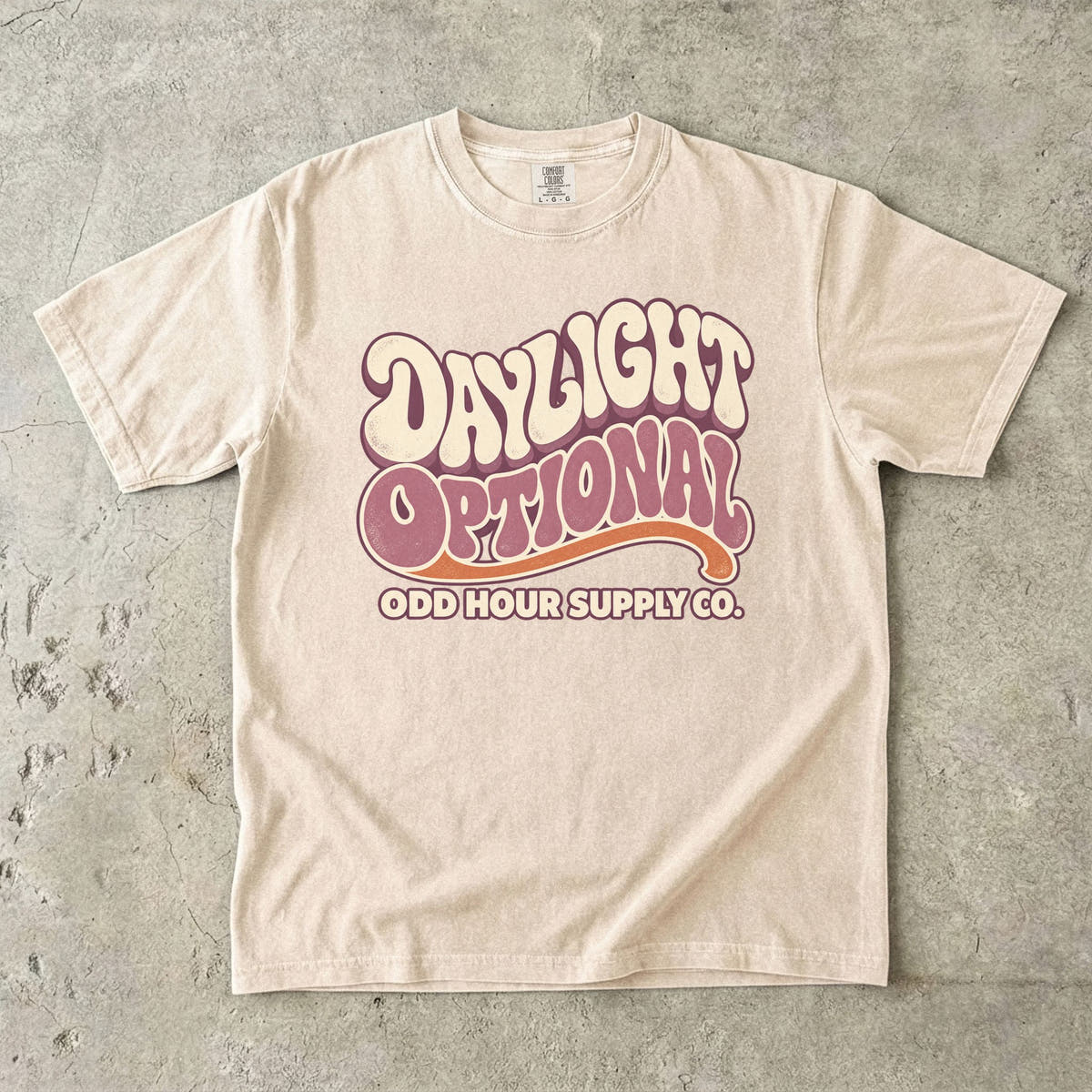 Ivory Comfort Colors 1717 T-shirt with the Daylight Optional graphic, front view