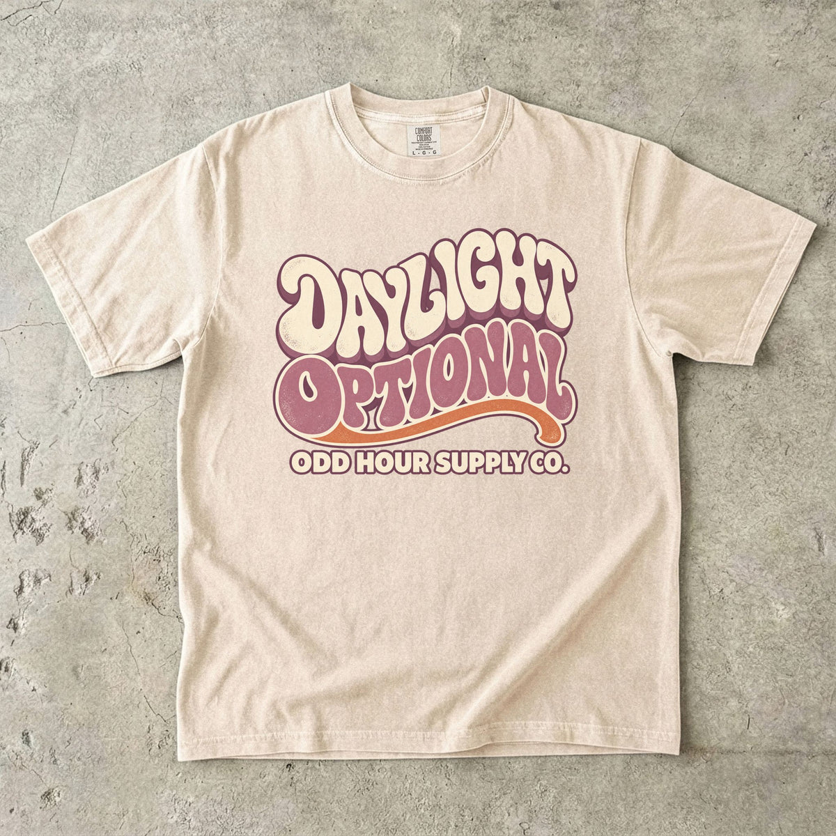 Ivory Comfort Colors 1717 T-shirt with the Daylight Optional graphic, front view