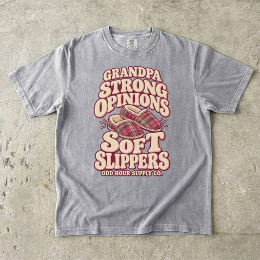 Grey T-shirt with GRANDPA STRONG OPINIONS SOFT SLIPPERS and two plaid slippers by Odd Hour Supply Co.