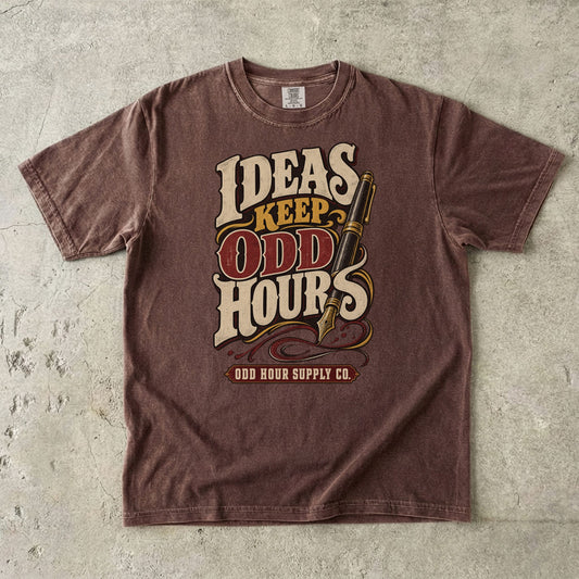 Espresso Comfort Colors 1717 T-shirt with the Ideas Keep Odd Hours graphic, front view