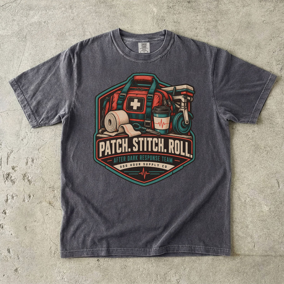 Pepper Comfort Colors 1717 T-shirt with Patch Stitch Roll badge, coral medical bag, bandages, coffee cup and teal details.