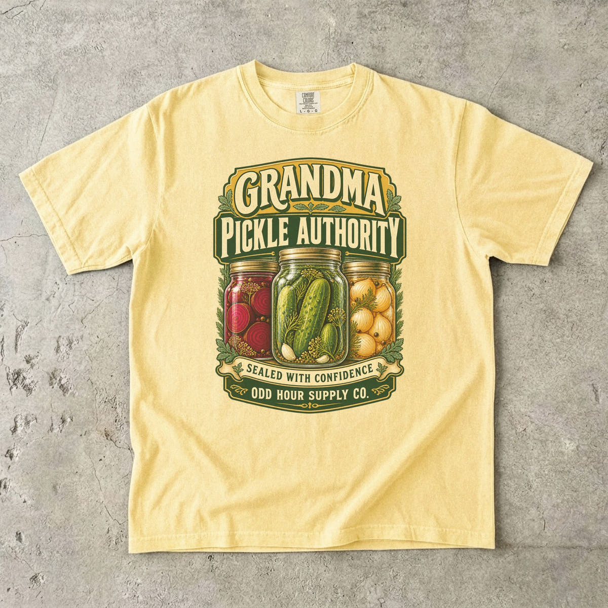 Butter Comfort Colors 1717 T-shirt with jars of pickles, beets, and onions, plus Grandma Pickle Authority and Sealed with Confidence lettering.
