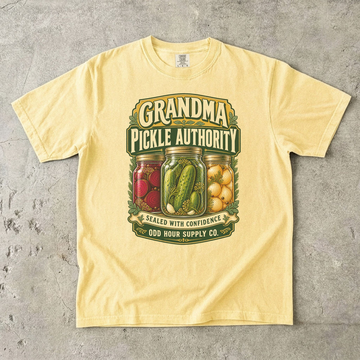 Butter Comfort Colors 1717 T-shirt with jars of pickles, beets, and onions, plus Grandma Pickle Authority and Sealed with Confidence lettering.
