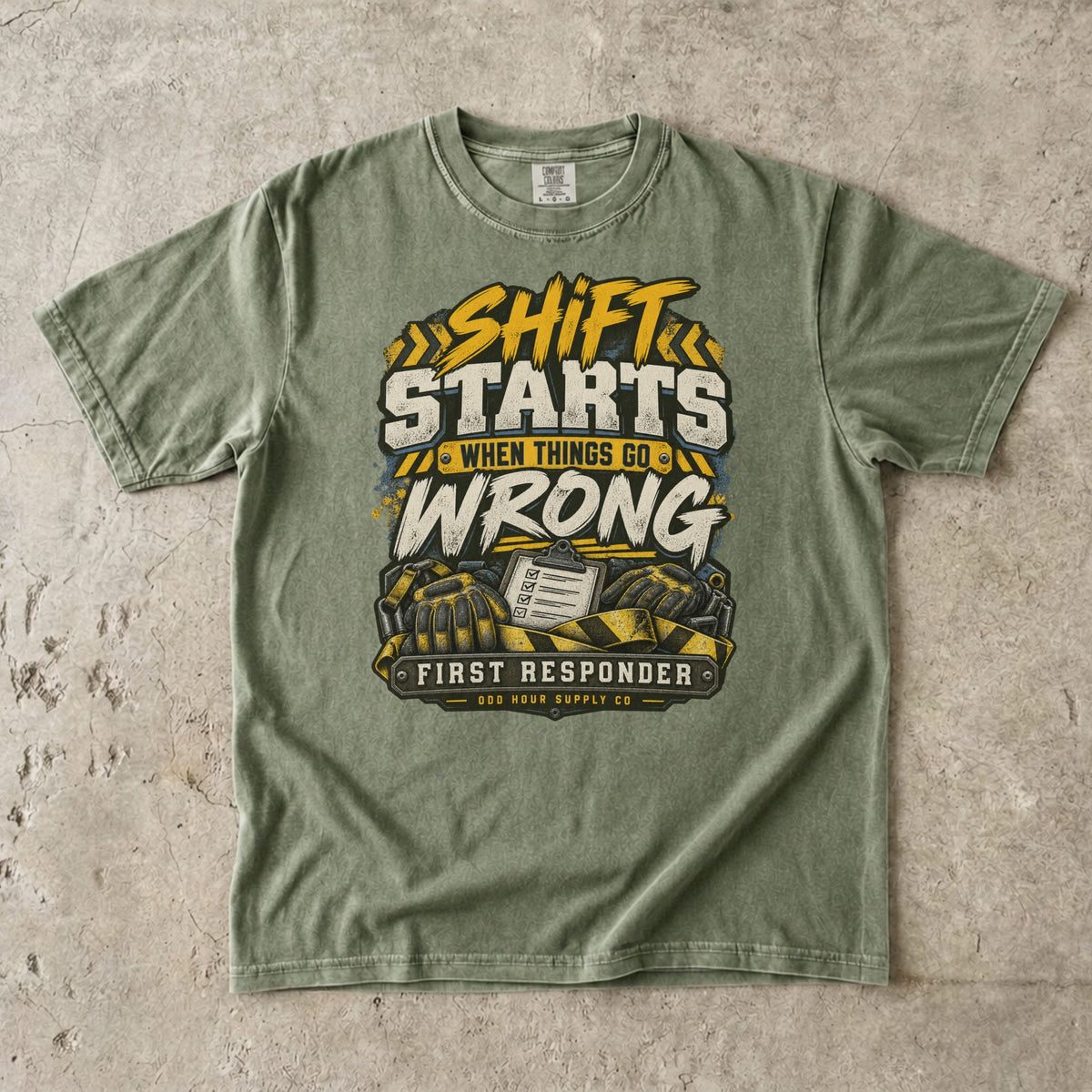 Hemp Comfort Colors 1717 T-shirt with Shift Starts When Things Go Wrong graphic, yellow hazard stripes, gloves and clipboard.