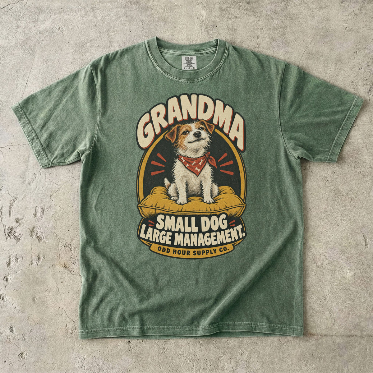 Moss Comfort Colors 1717 T-shirt with a terrier on a mustard cushion, a red bandana, and Grandma Small Dog Large Management lettering.
