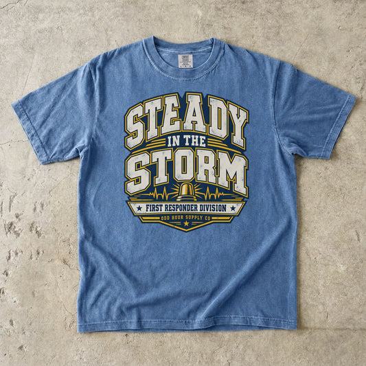 Washed Denim Comfort Colors 1717 T-shirt with Steady in the Storm college graphic, yellow beacon, pulse lines and First Responder Division text.
