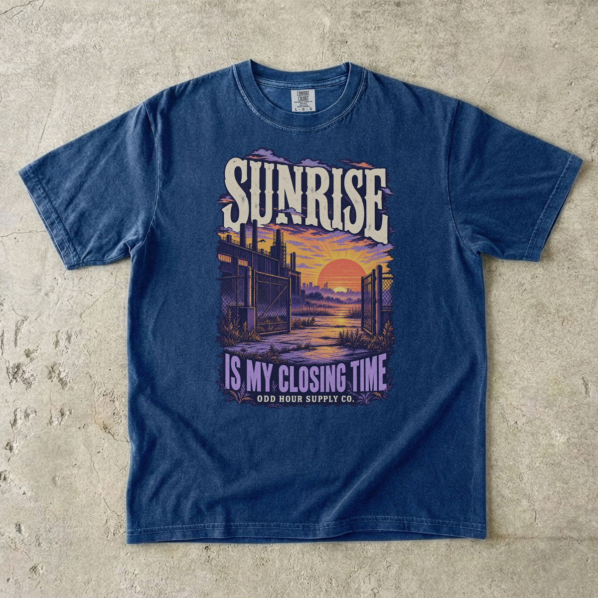 True Navy T-shirt with a purple and orange sunrise and SUNRISE IS MY CLOSING TIME by Odd Hour Supply Co.