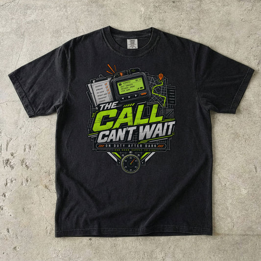 Black Comfort Colors 1717 T-shirt with The Call Can't Wait graphic, lime-green lettering, dispatch device, route map and stopwatch.