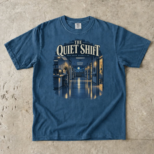 The Quiet Shift hospital corridor graphic on a Midnight Comfort Colors 1717 T-shirt