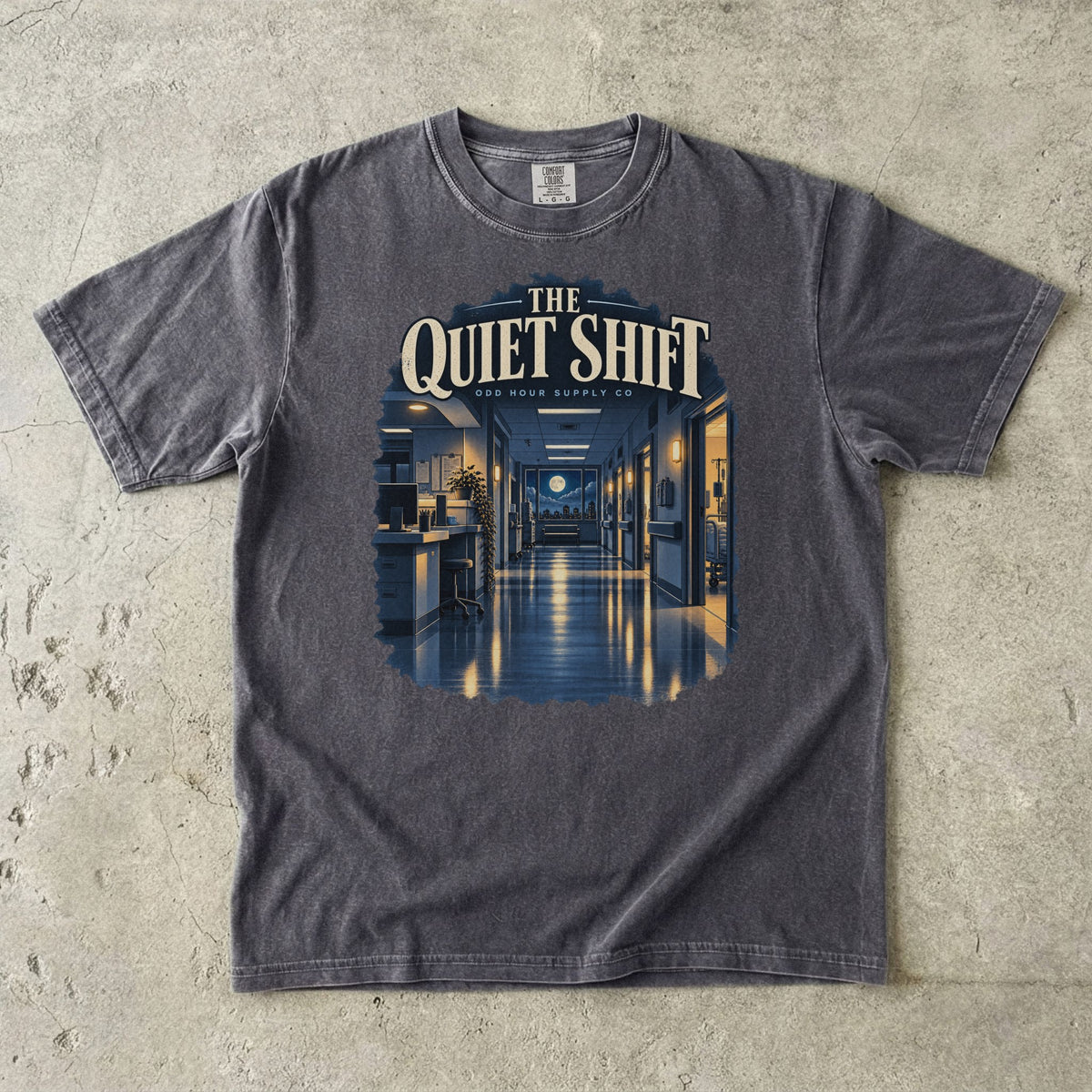The Quiet Shift hospital corridor graphic on a Pepper Comfort Colors 1717 T-shirt