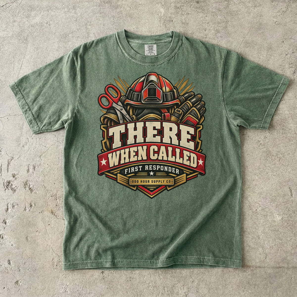 Moss Comfort Colors 1717 T-shirt with There When Called badge, rescue helmet, shears, gloves and a deep-red banner.