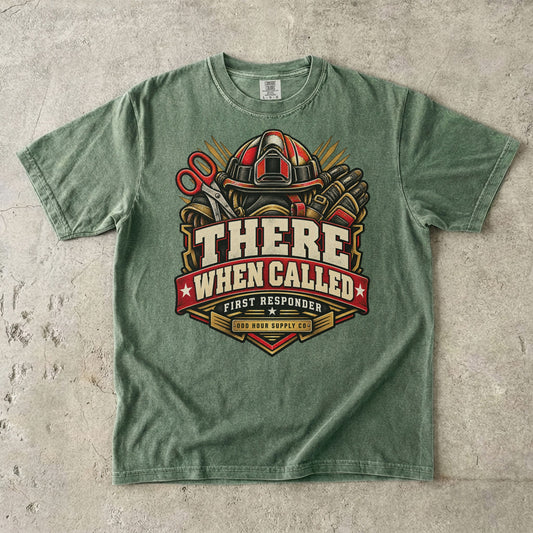 Moss Comfort Colors 1717 T-shirt with There When Called badge, rescue helmet, shears, gloves and a deep-red banner.