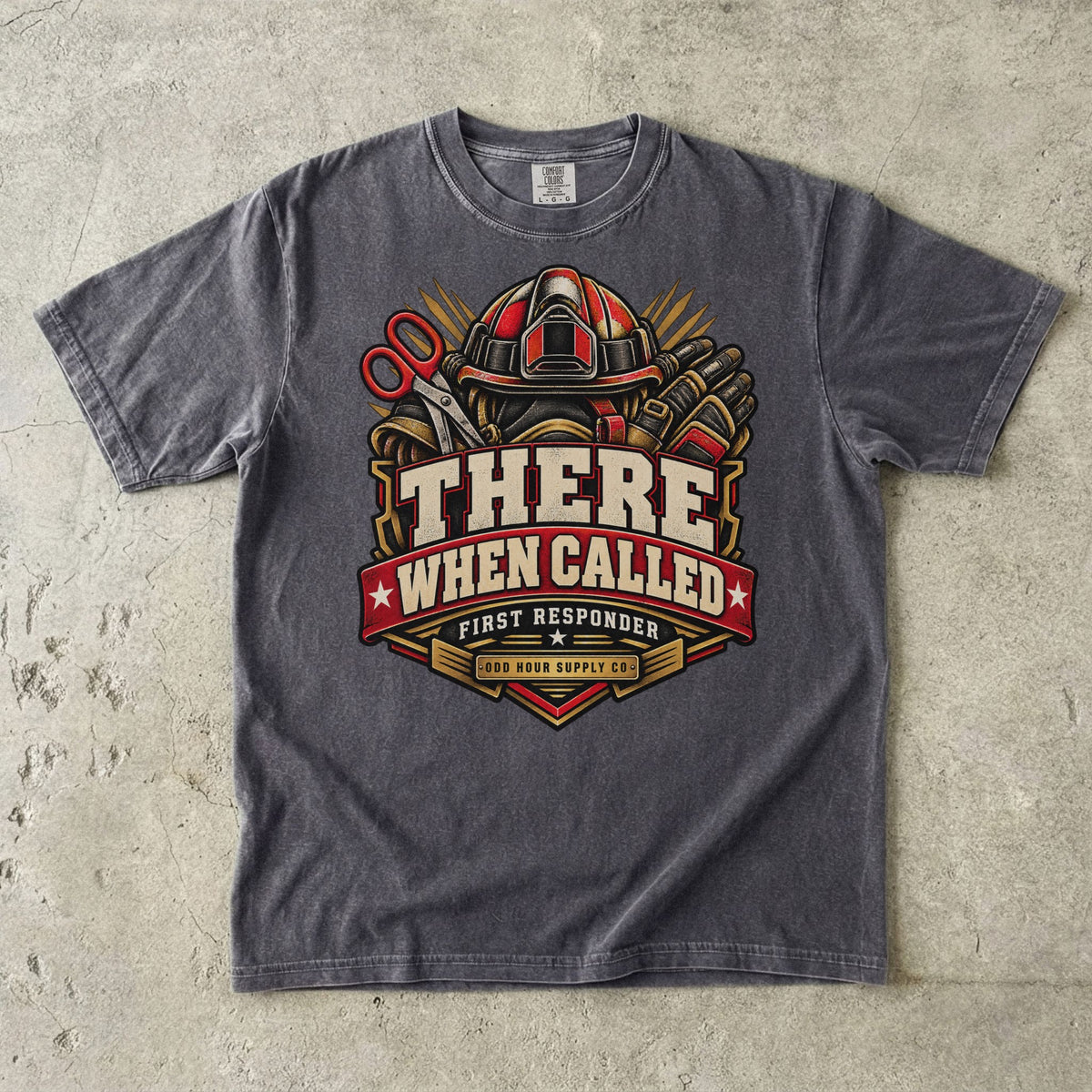 Pepper Comfort Colors 1717 T-shirt with There When Called badge, rescue helmet, shears, gloves and a deep-red banner.
