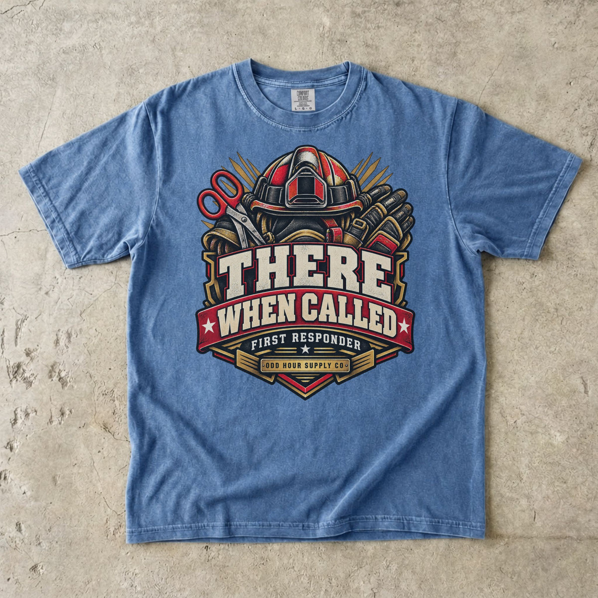 Washed Denim Comfort Colors 1717 T-shirt with There When Called badge, rescue helmet, shears, gloves and a deep-red banner.