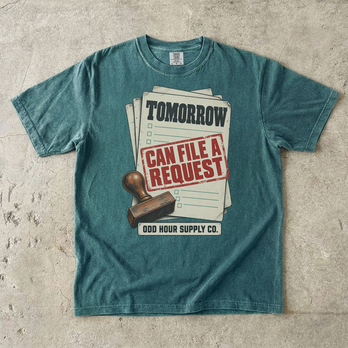 Blue Spruce T-shirt with paperwork, a black TOMORROW heading and a red CAN FILE A REQUEST stamp by Odd Hour Supply Co.