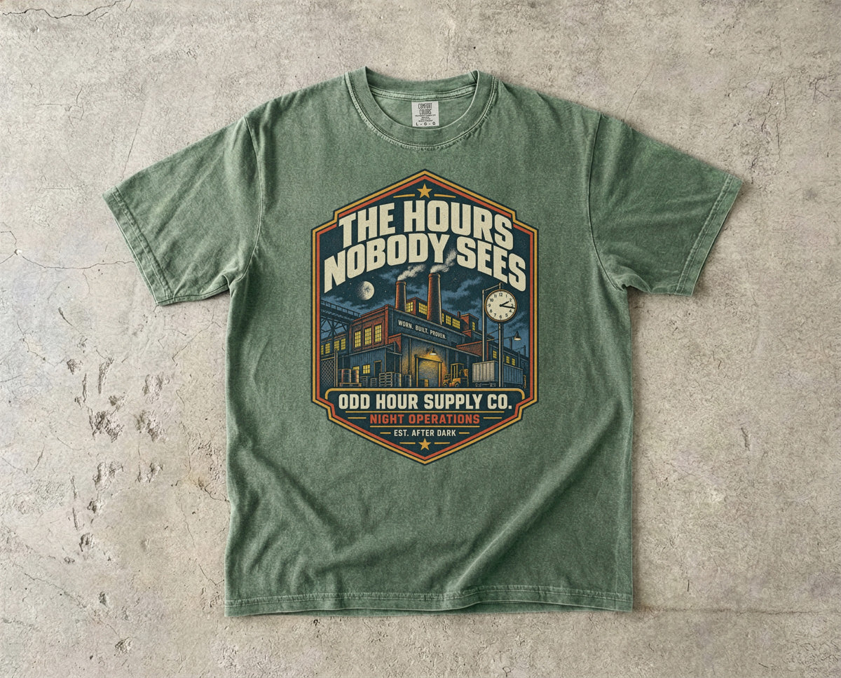 The Hours Nobody Sees vintage badge T-shirt in Moss, Comfort Colors 1717 front view